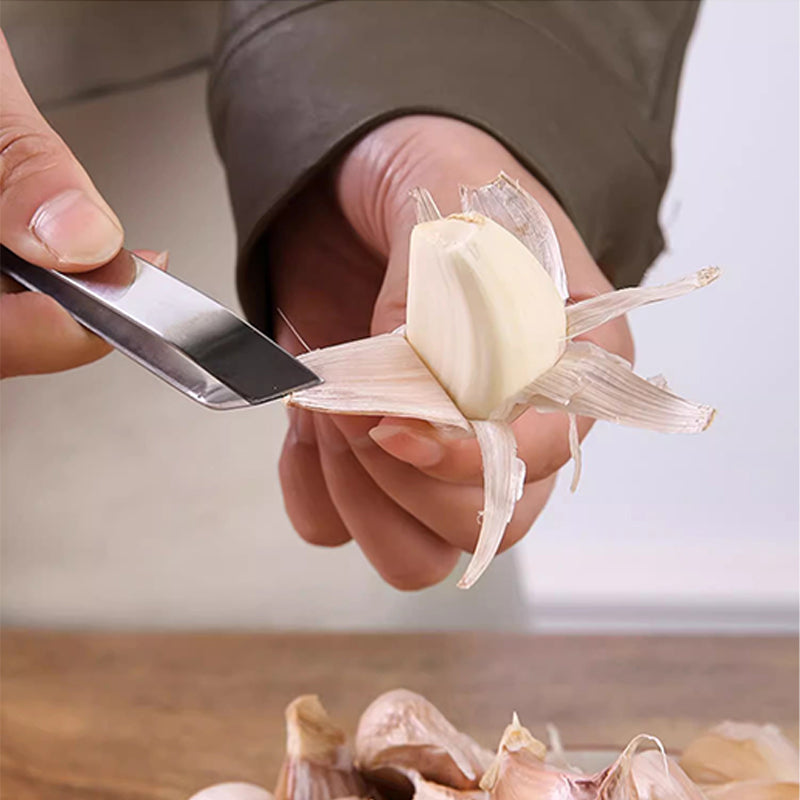 🎉[Kreativ present]🎁Högkvalitativa 304 rostfria stålklämmor för att skala vitlök i köket💥Köp 2 få 3 gratis tidsbegränsat erbjudande